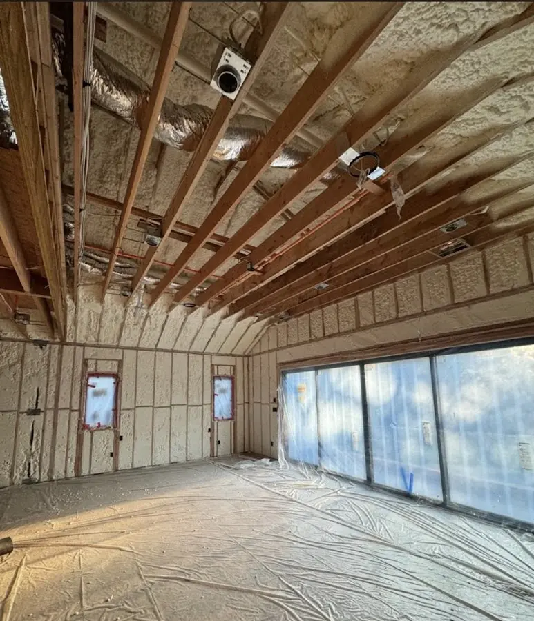 Interior walls and ceiling insulated with spray foam during new construction in White Center